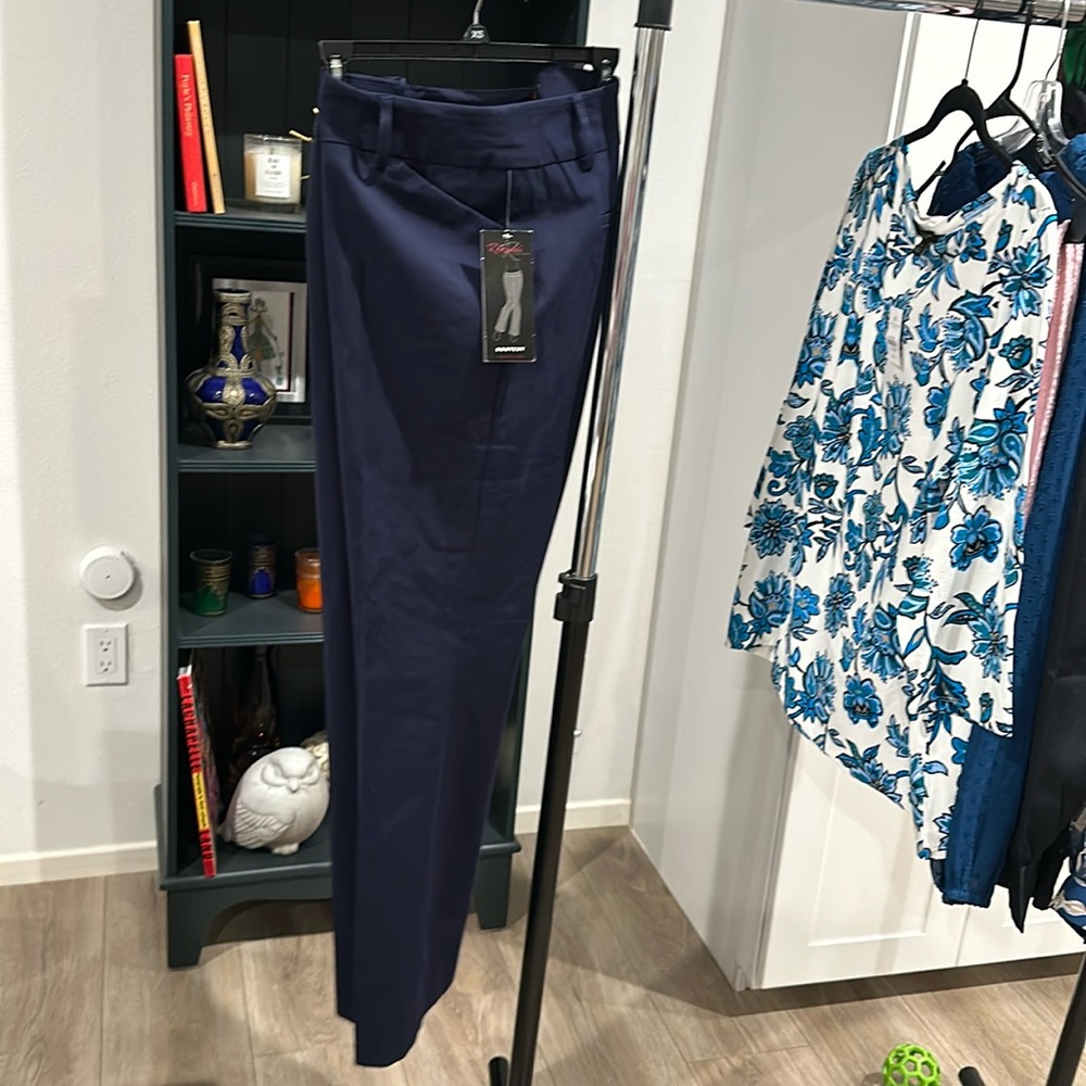New navy boot cut pants size 18.  52% cotton 41% rayon 8% spandex